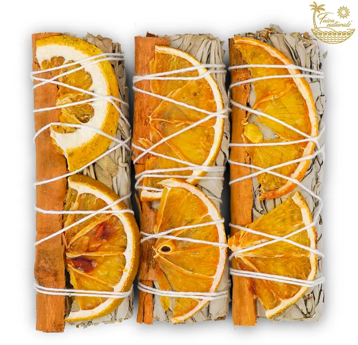 Orange slices and cinnamon smudge sticks